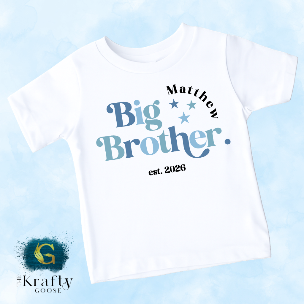 A white t-shirt with a graphic design that says "Big Brother" and "Est. 2026" printed on it.
