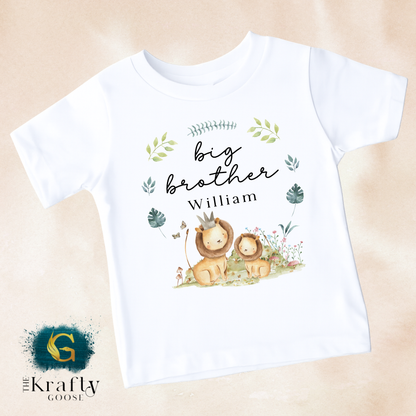 A white t-shirt with a printed design featuring two lions and the text "Big brother William" along with some decorative elements.